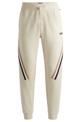 Hugo Boss Cotton-terry Tracksuit Bottoms With Signature-stripe Tape In Neutral
