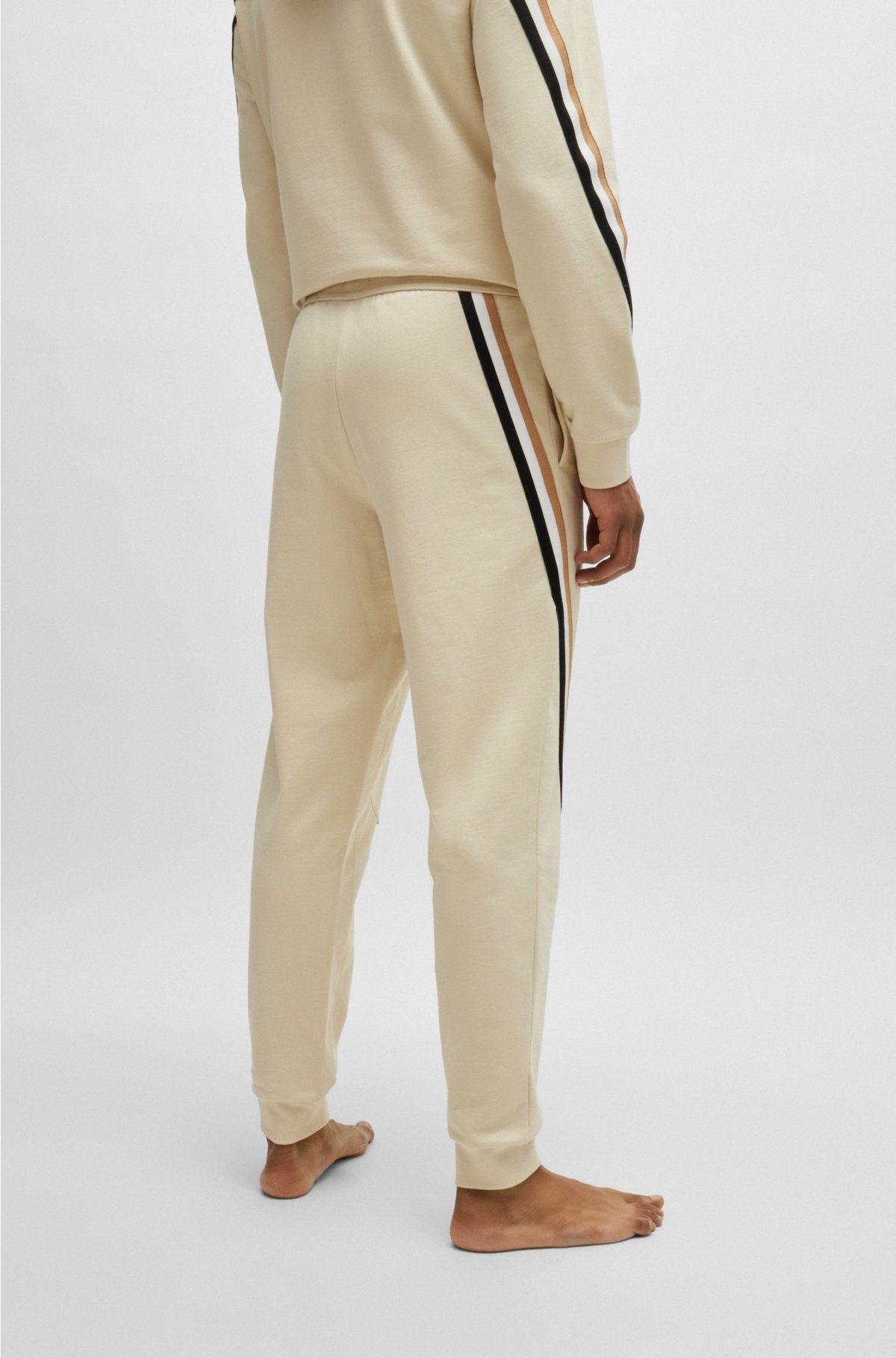 Cotton-terry tracksuit bottoms with signature-stripe tape, Light Beige