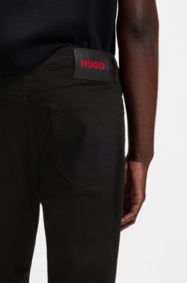 Jeans slim fit in denim elasticizzato nero intenso, Nero