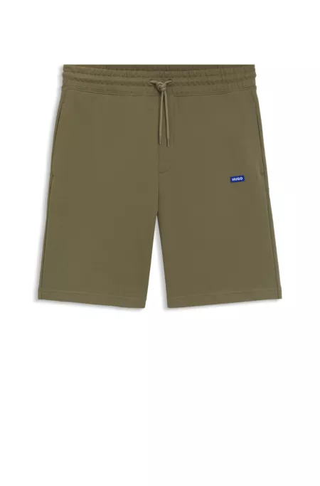 Drawstring shorts in cotton terry with blue logo label
