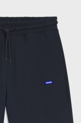 Shorts i terry-bomull med bl&aring;tt logom&auml;rke, M&ouml;rkbl&aring;