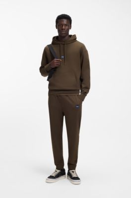 Tuta sportiva in terry di cotone con etichette con logo blu, Marrone scuro