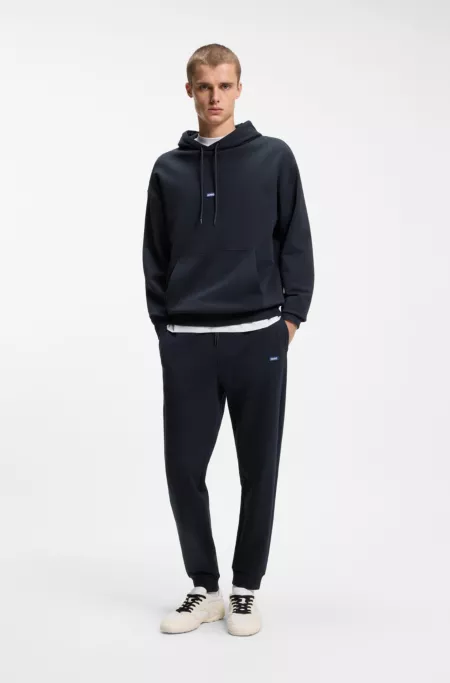 Cotton-terry tracksuit with blue logo labels