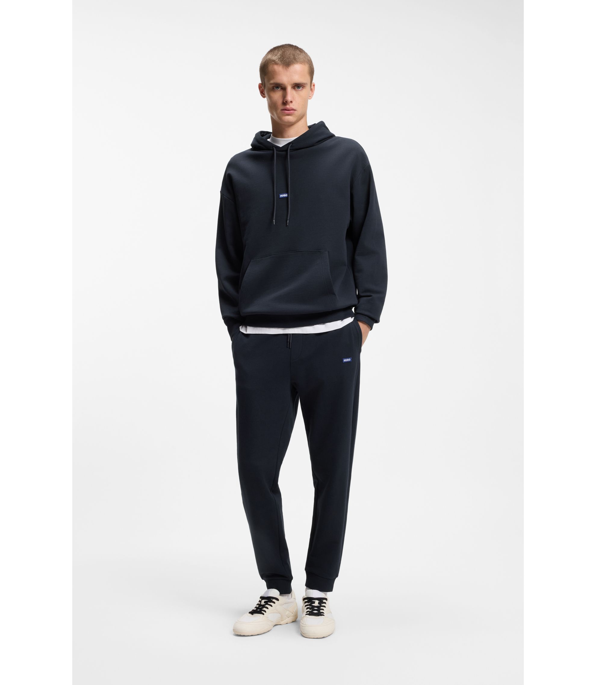 Trainingsanzug aus Baumwoll-Terry mit blauen Logo-Labels