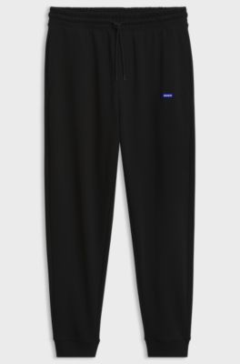 Regular-fit tracksuit bottoms in French-terry cotton, Black