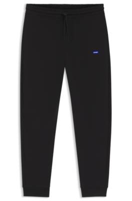 Cotton-terry tracksuit bottoms with logo patch 1