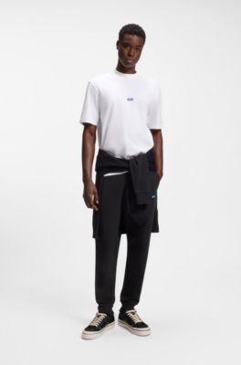 Cotton-terry tracksuit bottoms with blue logo patch, Black