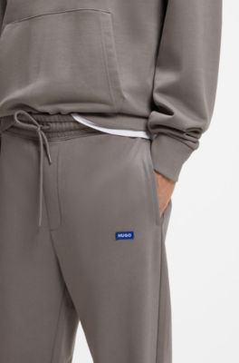 Regular-fit tracksuit bottoms in French-terry cotton, Grey