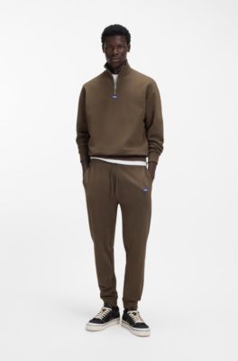 Cotton-terry tracksuit bottoms with logo patch, Dark Brown