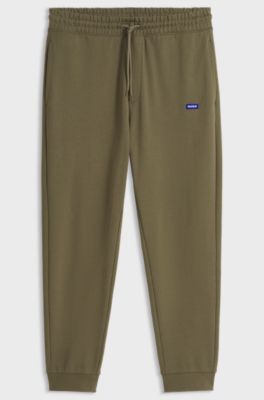 Regular-fit tracksuit bottoms in French-terry cotton, Olive