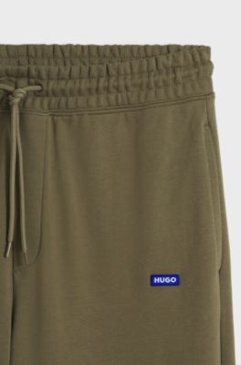 Regular-fit tracksuit bottoms in French-terry cotton, Olive
