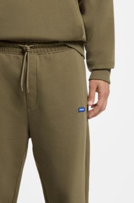 Regular-fit tracksuit bottoms in French-terry cotton, Olive
