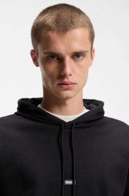 Hoodie aus Baumwoll-Terry mit blauem Logo-Aufn&auml;her, Schwarz