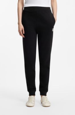 Cotton-terry tracksuit bottoms with embroidered logo, Black