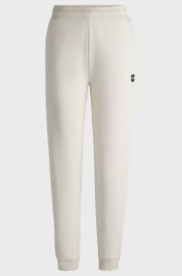 Joggingbroek met logostiksel van katoenen sweatstof, Naturel