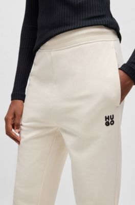 Cotton-terry tracksuit bottoms with embroidered logo, Natural