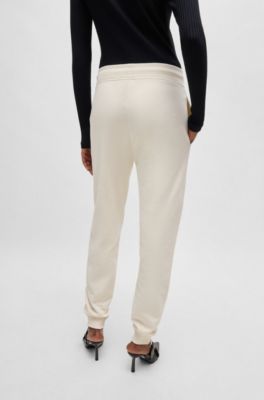 Joggingbroek met logostiksel van katoenen sweatstof, Naturel