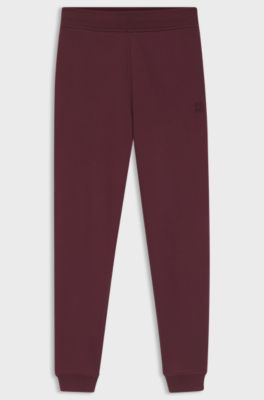 Cotton-terry tracksuit bottoms with embroidered logo, Bordeaux