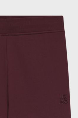 Cotton-terry tracksuit bottoms with embroidered logo, Bordeaux
