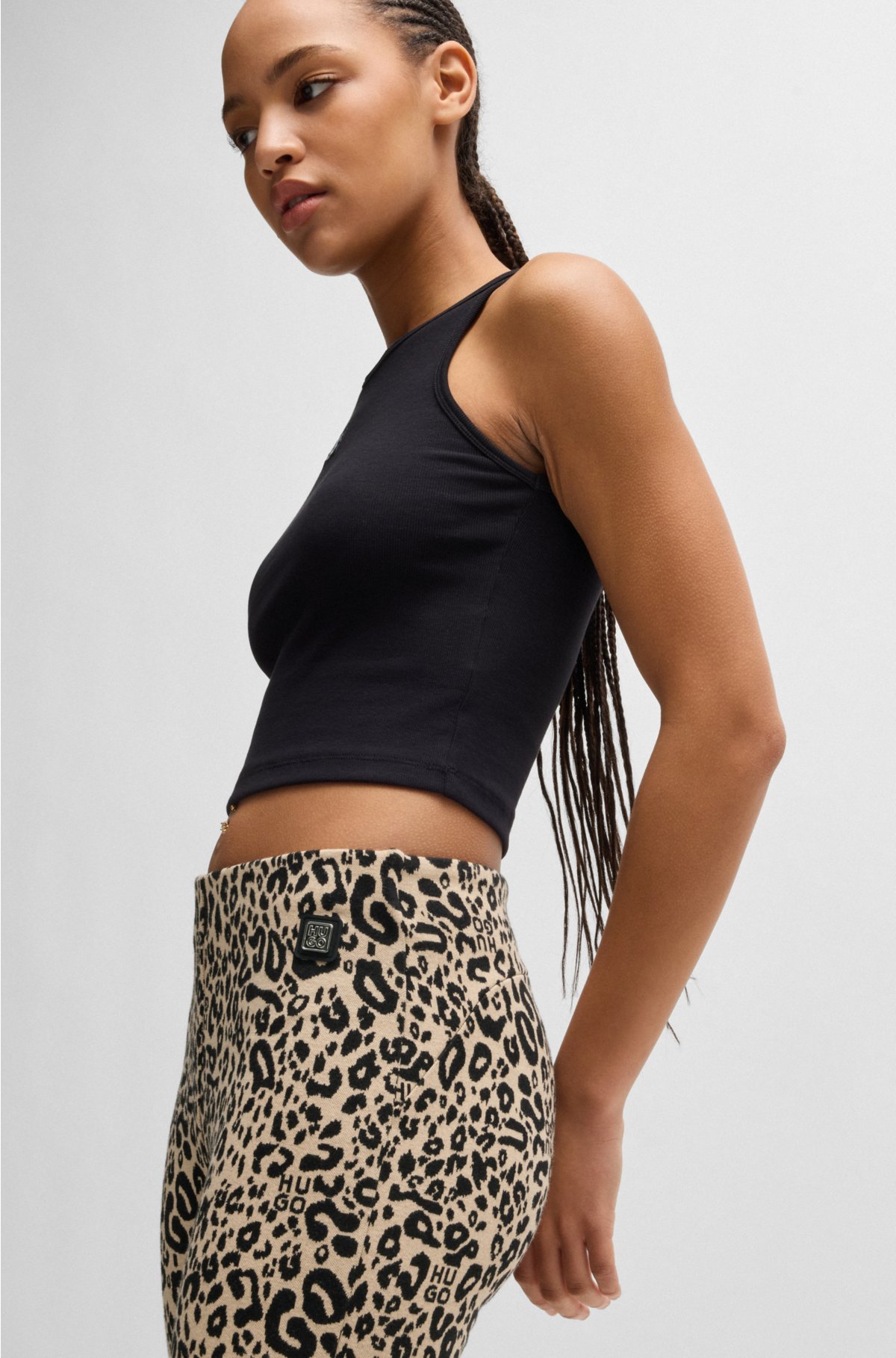 Slim-fit animal-print trousers with flared leg, Patterned