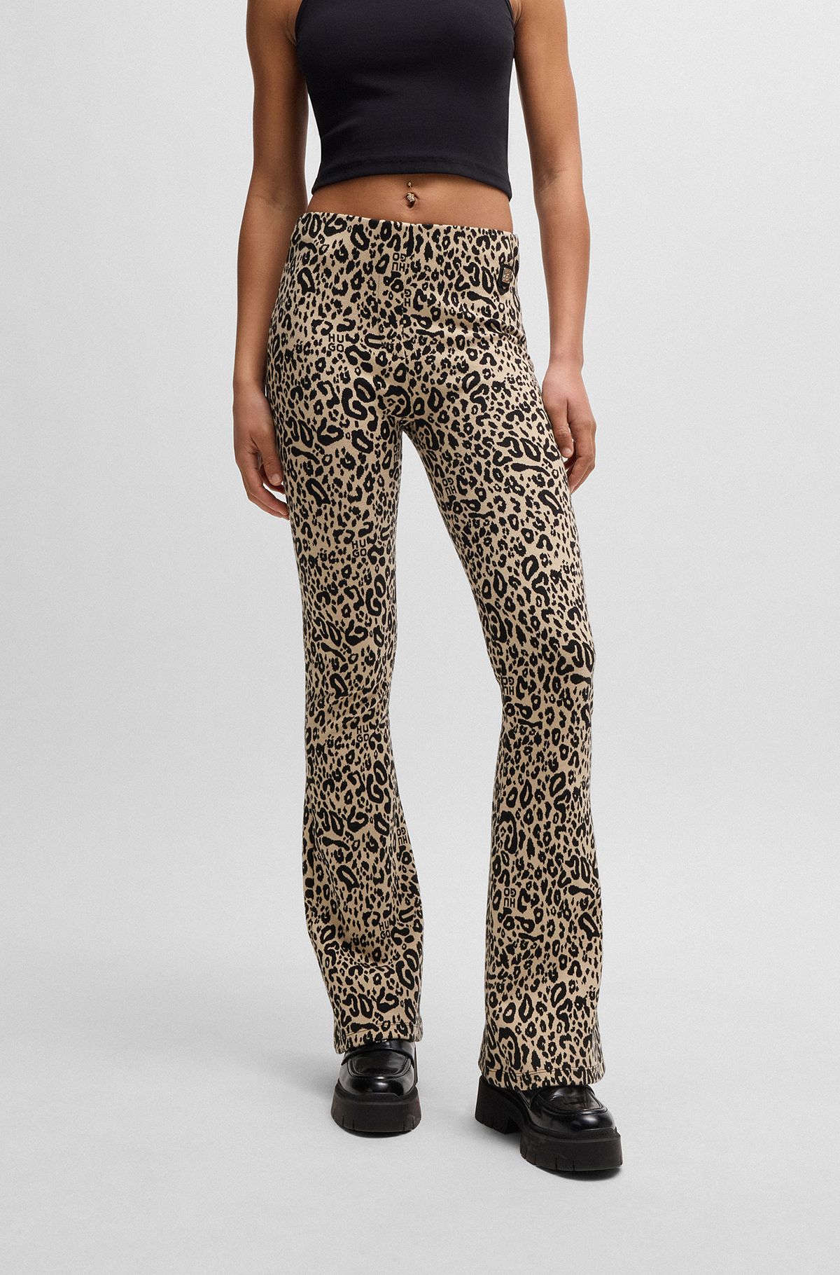 Slim-fit animal-print trousers with flared leg, Patterned