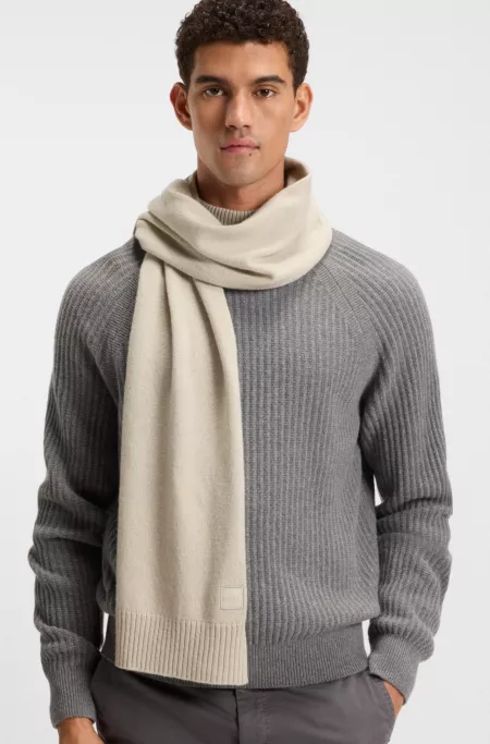 Ribbed-hem plain-knit scarf with woven logo badge
