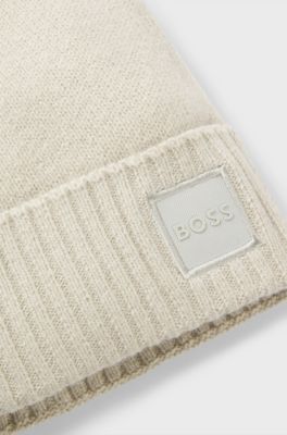 Knitted beanie hat with logo badge, Light Beige
