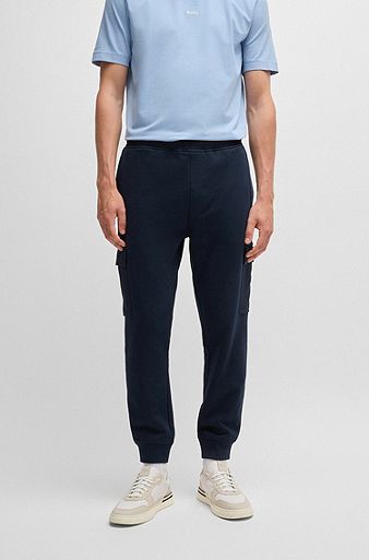 Cotton-terry tracksuit bottoms with cargo pockets, Dark Blue