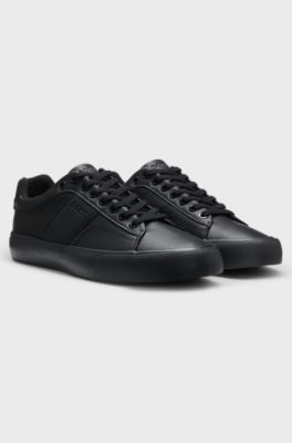 Faux-leather trainers with plain and grained textures, Black