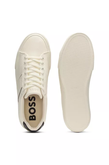 Faux-leather trainers with plain and grained textures