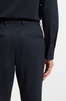 Pantalones slim fit en sirsaca el&aacute;stica, Azul oscuro