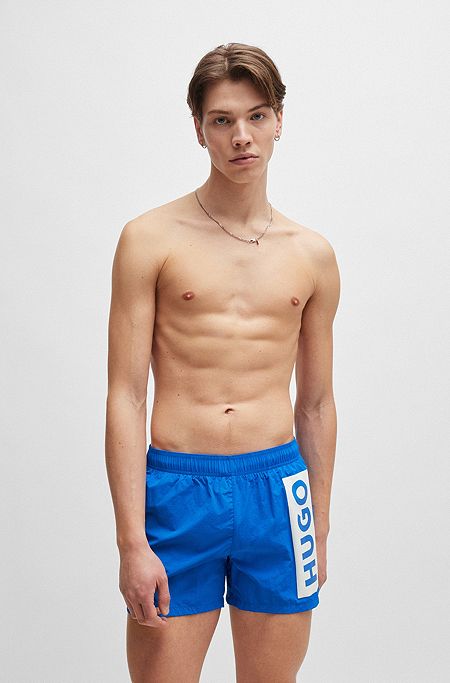 Partially lined quick-dry swim shorts with vertical logo, Blue
