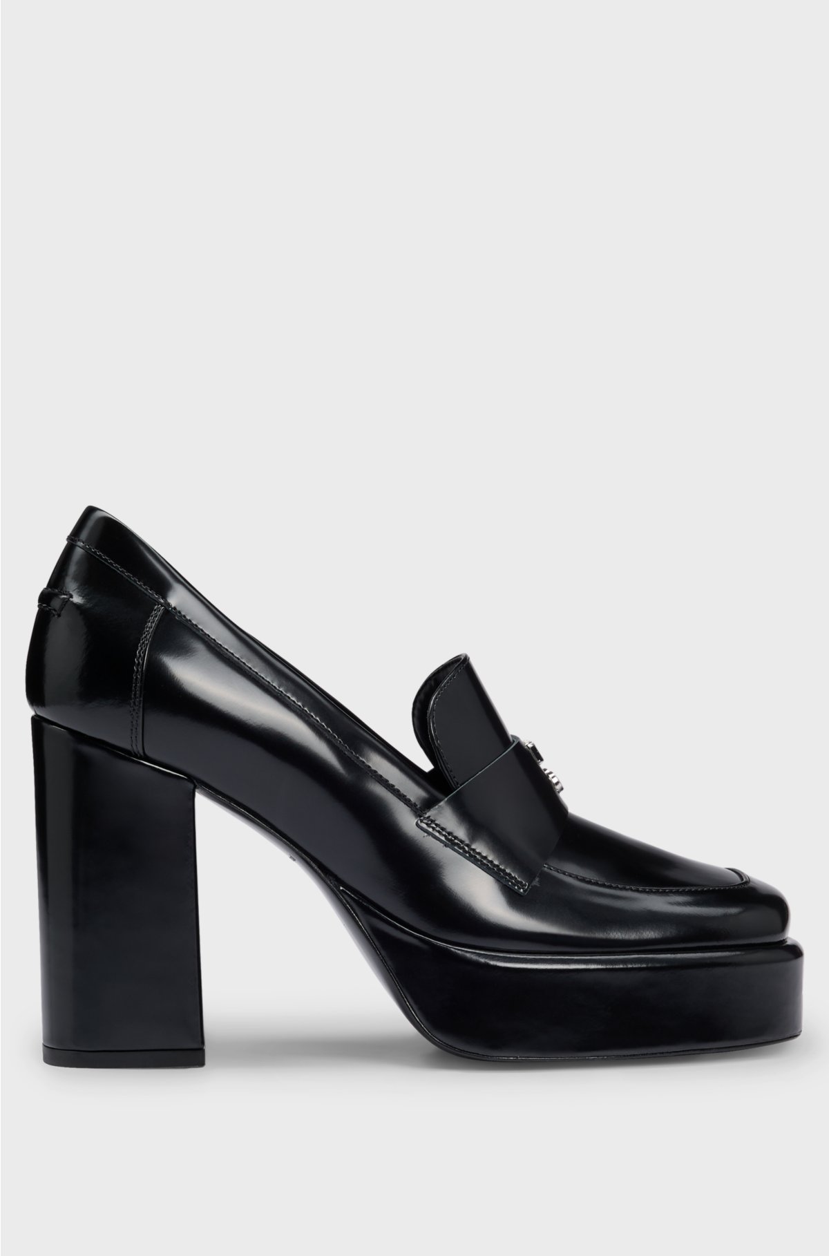 Platform loafers in leather with stacked-logo trim, Black