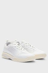 Mixed-material trainers with anti-slip sole, White