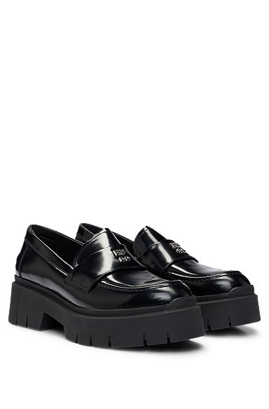 Stacked-logo loafers in leather with chunky sole, Black