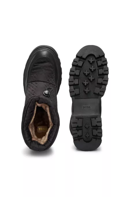 Monogram-pattern slim-fit boots with leather trims