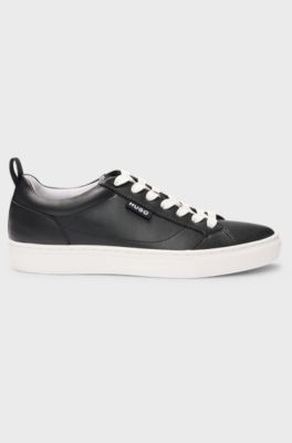 Cupsole trainers in faux leather with logo flag, Black