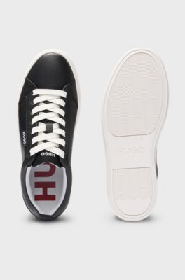 Cupsole trainers in faux leather with logo flag, Black