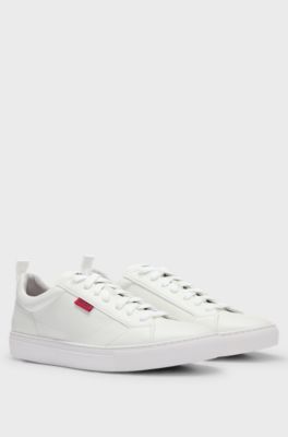Cupsole trainers in faux leather with logo flag, White