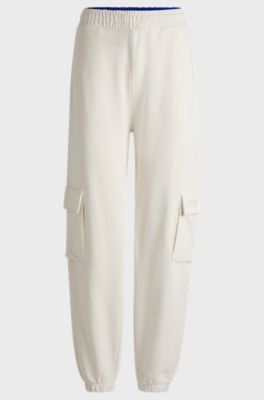 Cargo-style tracksuit bottoms in cotton terry, Natural