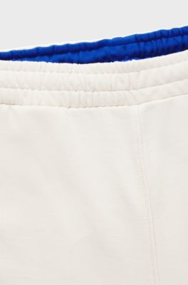 Cargo-style tracksuit bottoms in cotton terry, Natural