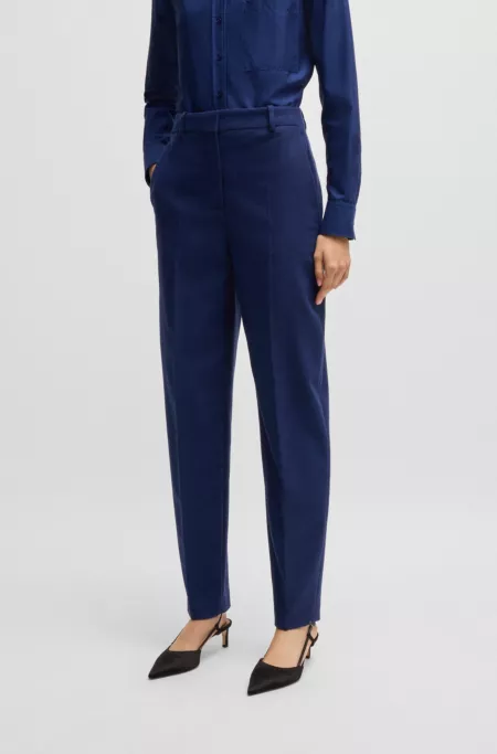 Regular-fit trousers in stretch cloth with tapered leg