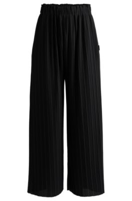 Regular fit-byxor i plisserad cr&ecirc;pe med h&ouml;g midja, Svart