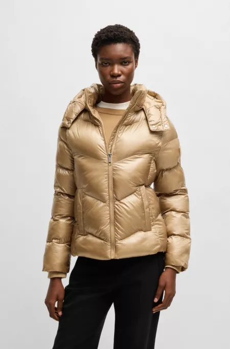 Water-repellent padded jacket with adjustable hood