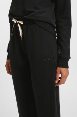Cuffed tracksuit bottoms with signature-stripe drawcord, Black