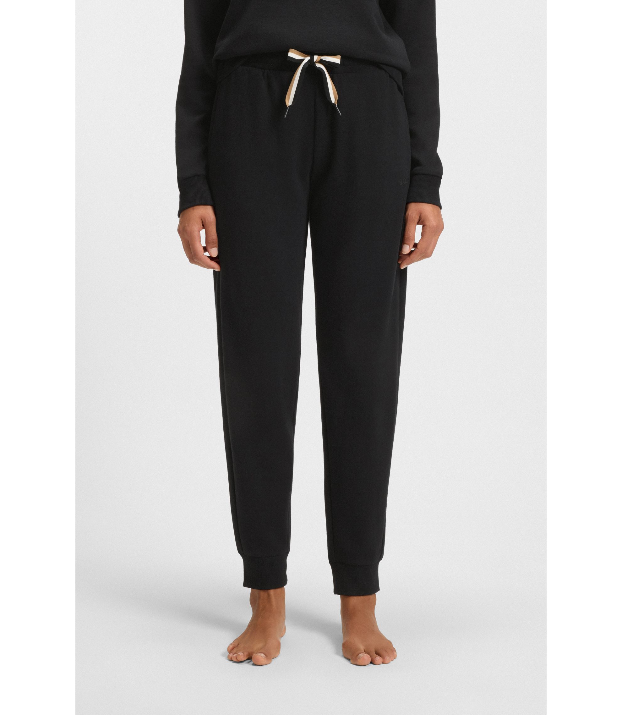 Jogginghose mit Beinbündchen und Signature-Streifen an den Kordeln