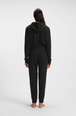 Cuffed tracksuit bottoms with signature-stripe drawcord, Black