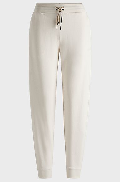 Cuffed tracksuit bottoms with signature-stripe drawcord, White