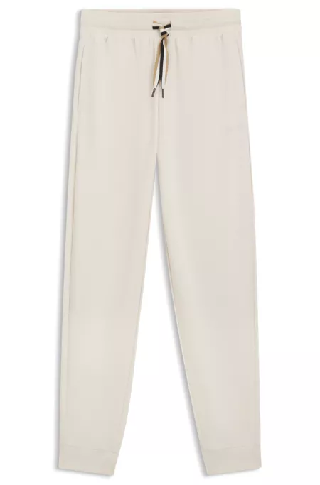 Cuffed tracksuit bottoms with signature-stripe drawcord
