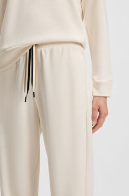Cuffed tracksuit bottoms with signature-stripe drawcord, Natural